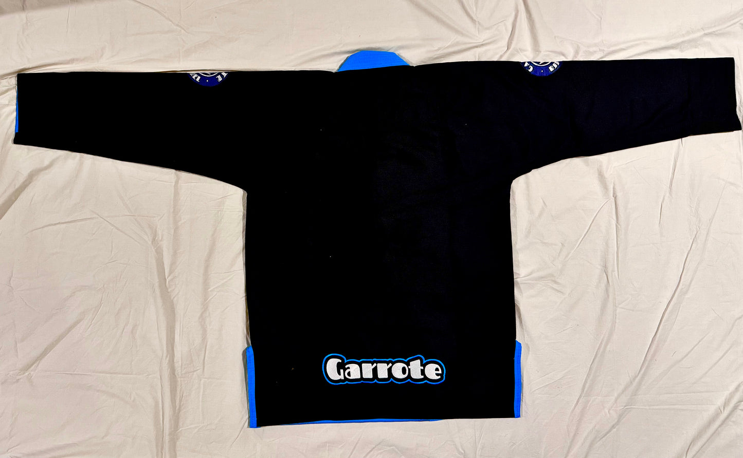 Garrote BJJ Apparel lightweight 350GSM Kimono Jet Black / Bright Baby Blue Lapels, Trims